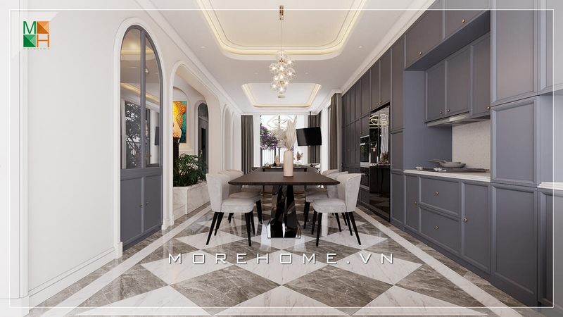 Nét tân cổ điển được thể hiện qua từng chi tiết, từ trần thạch cao giật cấp, từ những đường nét phào chỉ mềm mại trên cửa, từ đá lát sàn tông đen - trắng cổ điển, những đường bo cong trên bộ bàn ghế ăn đến bộ tủ bếp với những đường khắc đối xứng tinh tế